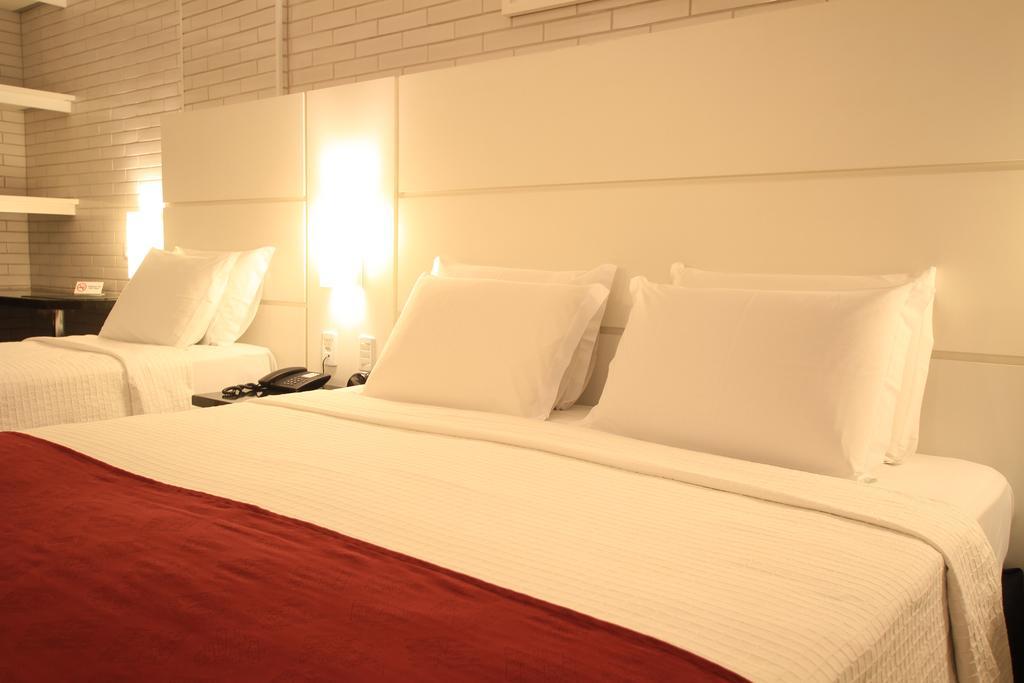 Hotel Confiance Prime Batel Curitiba Quarto foto